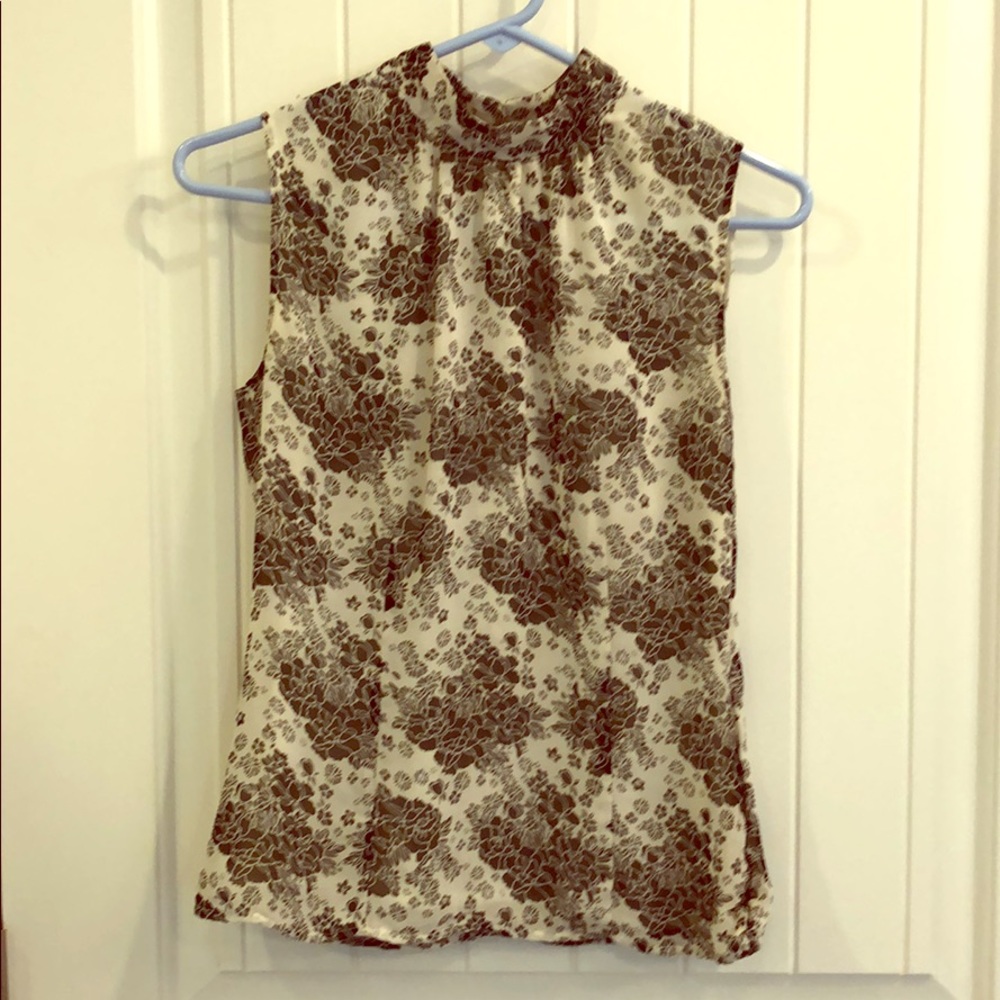 Blacks and white lightweight sleeveless blouse